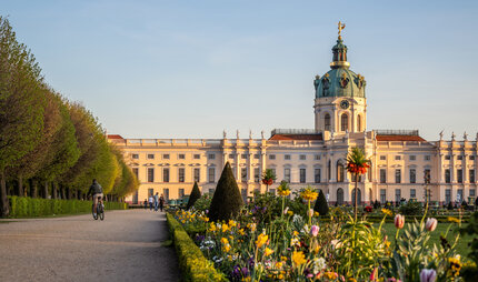 The park of Charlottenburg Palace in Berlin in springtime x