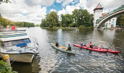 With canoe and kayak on the Spree at the Abteibrücke in Berlin Treptow