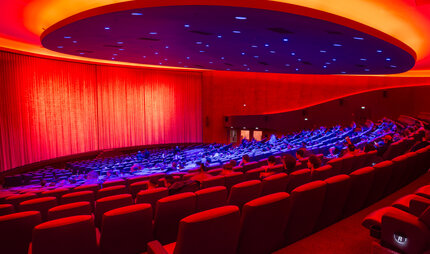Cinema auditorium in Zoopalast with red lighting